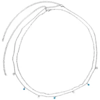 Silberne Bauchketten aus Chirurgenstahl Doppelte Bauchketten aus silbernem Chirurgenstahl mit blauen und weißen Akzenten auf weißem Hintergrund