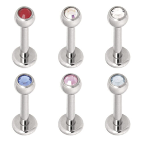 Sechs silberne Titan Labrets mit bunten Kristallen auf weißem Hintergrund