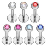 Silberne Titan-Labrets mit klaren, roten, rosa und blauen Kristallen auf weißem Hintergrund
