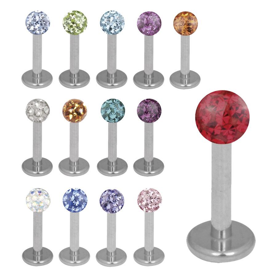 Silberner Titan Labret mit Kristallen Silberner Labret aus Titan mit verschiedenen Kristallfarben auf Weiß